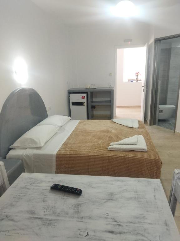Postel nebo postele na pokoji v ubytování Ira Apartments