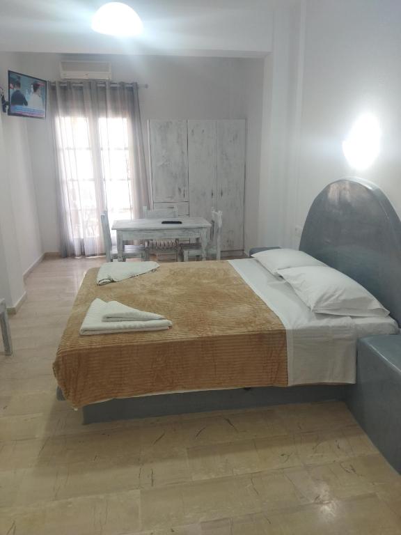 Postel nebo postele na pokoji v ubytování Ira Apartments