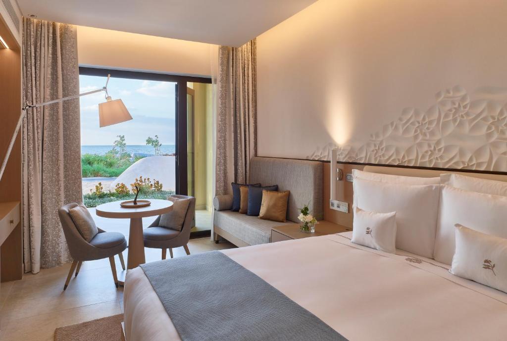 Postel nebo postele na pokoji v ubytování Zulal Wellness Resort by Chiva-Som