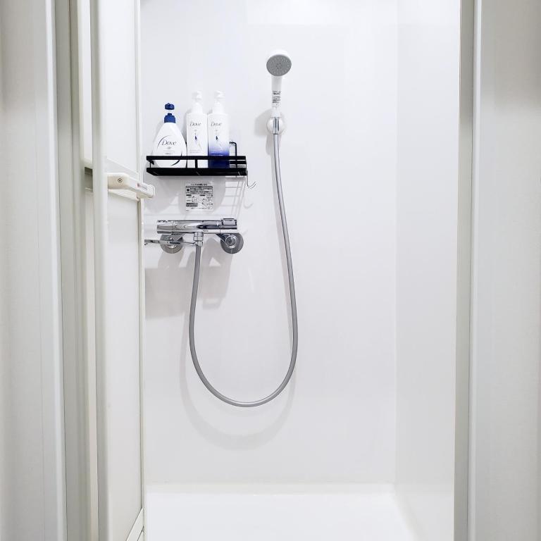 Koupelna v ubytování Rooms
