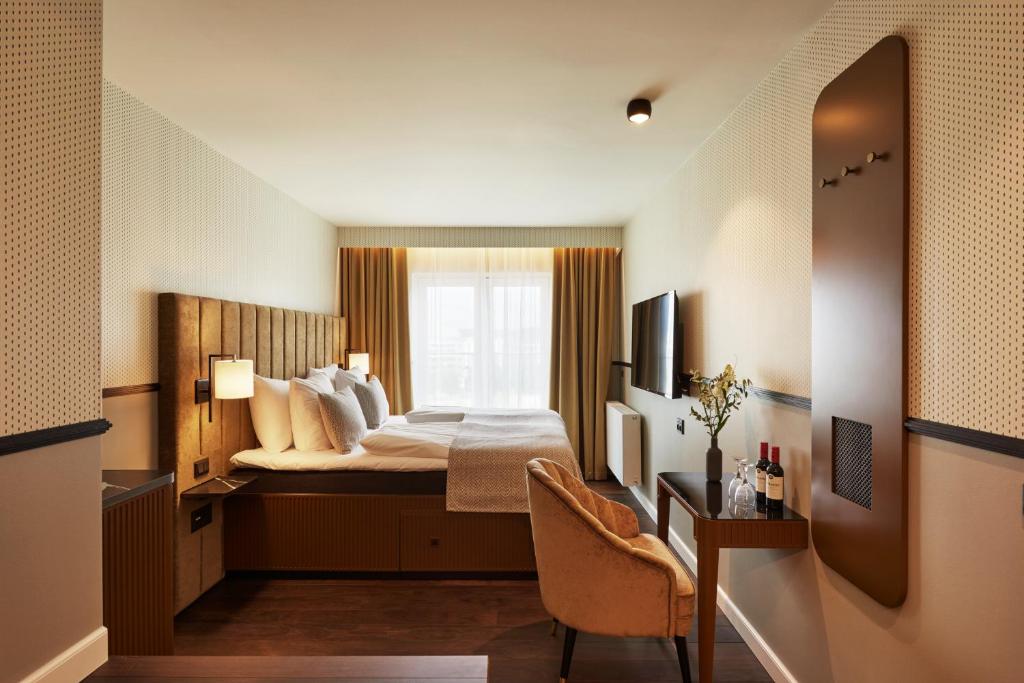 TV a/nebo společenská místnost v ubytování WIDE Hotel