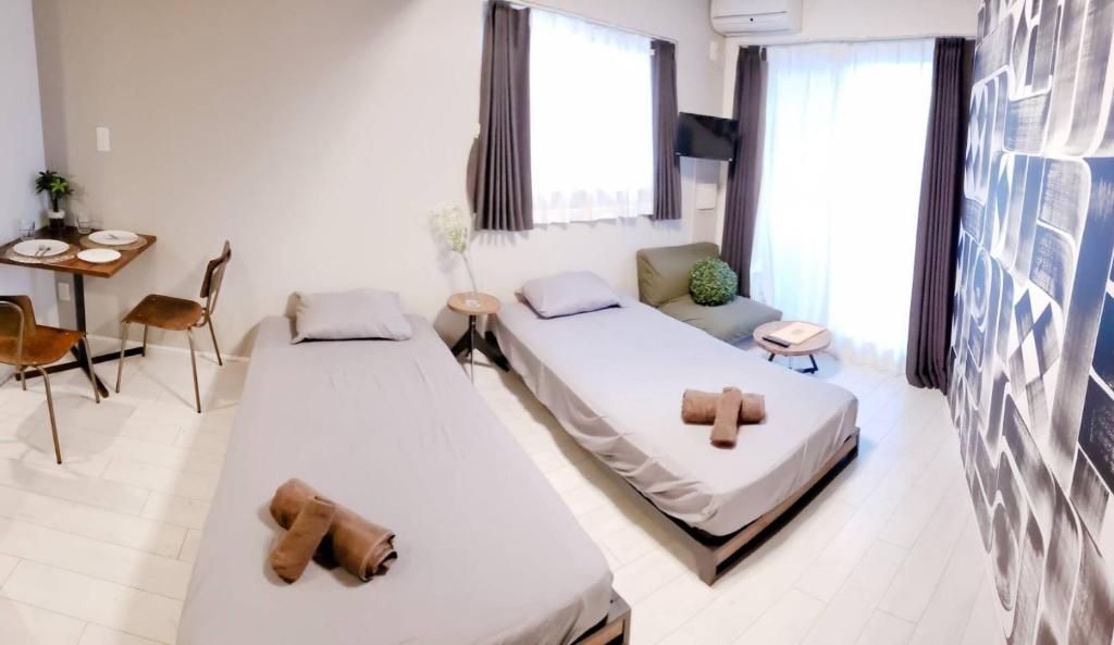 Ένα ή περισσότερα κρεβάτια σε δωμάτιο στο AOCA Kaminoge - Vacation STAY 11984
