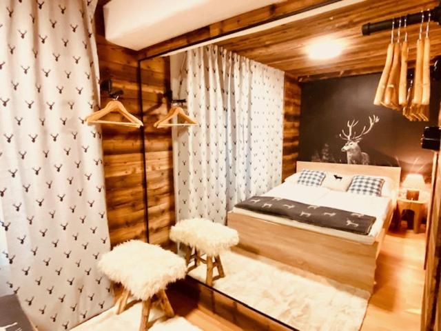 Postel nebo postele na pokoji v ubytování Wilderer Suiten Mariazell