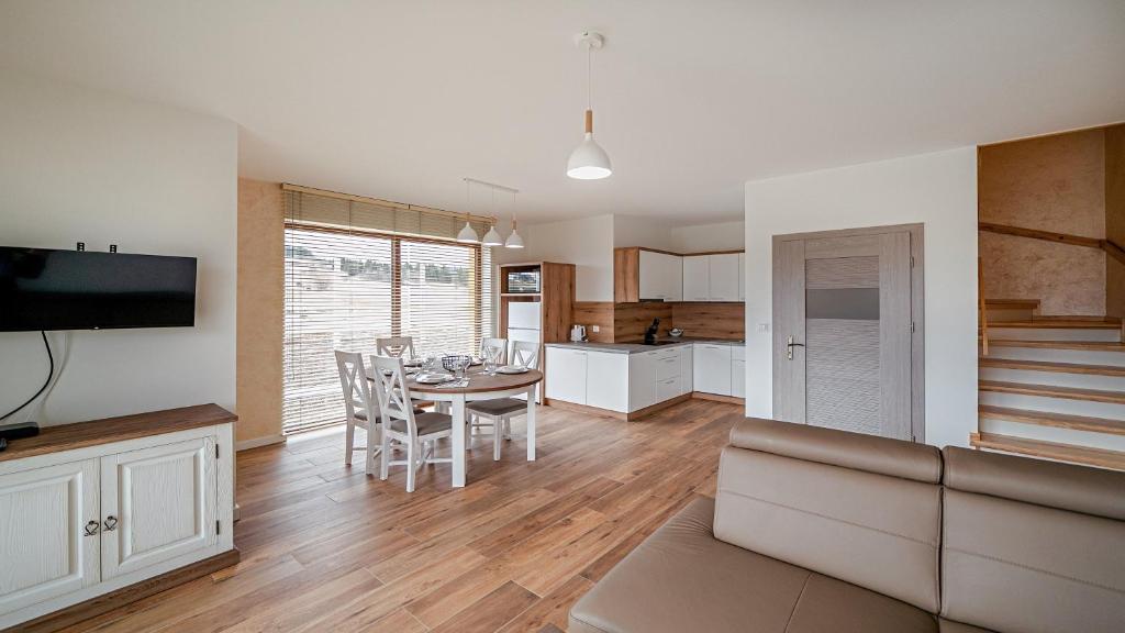 Kuchyň nebo kuchyňský kout v ubytování Apartamenty Sun & Snow Kaniówka