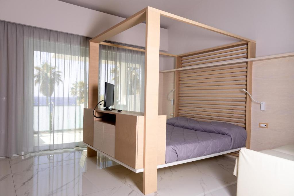 Postel nebo postele na pokoji v ubytování Hotel Villaggio Stromboli