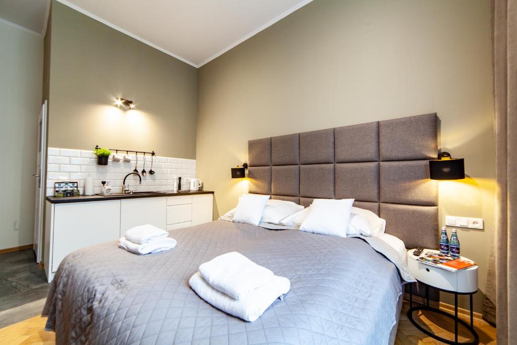 Posteľ alebo postele v izbe v ubytovaní MILU Apartments Kurkowa