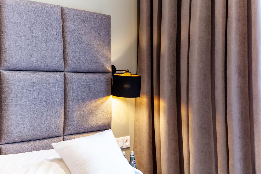 Posteľ alebo postele v izbe v ubytovaní MILU Apartments Kurkowa