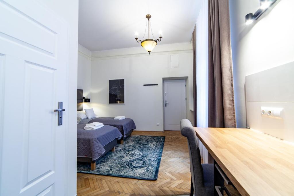 Posteľ alebo postele v izbe v ubytovaní MILU Apartments Kurkowa