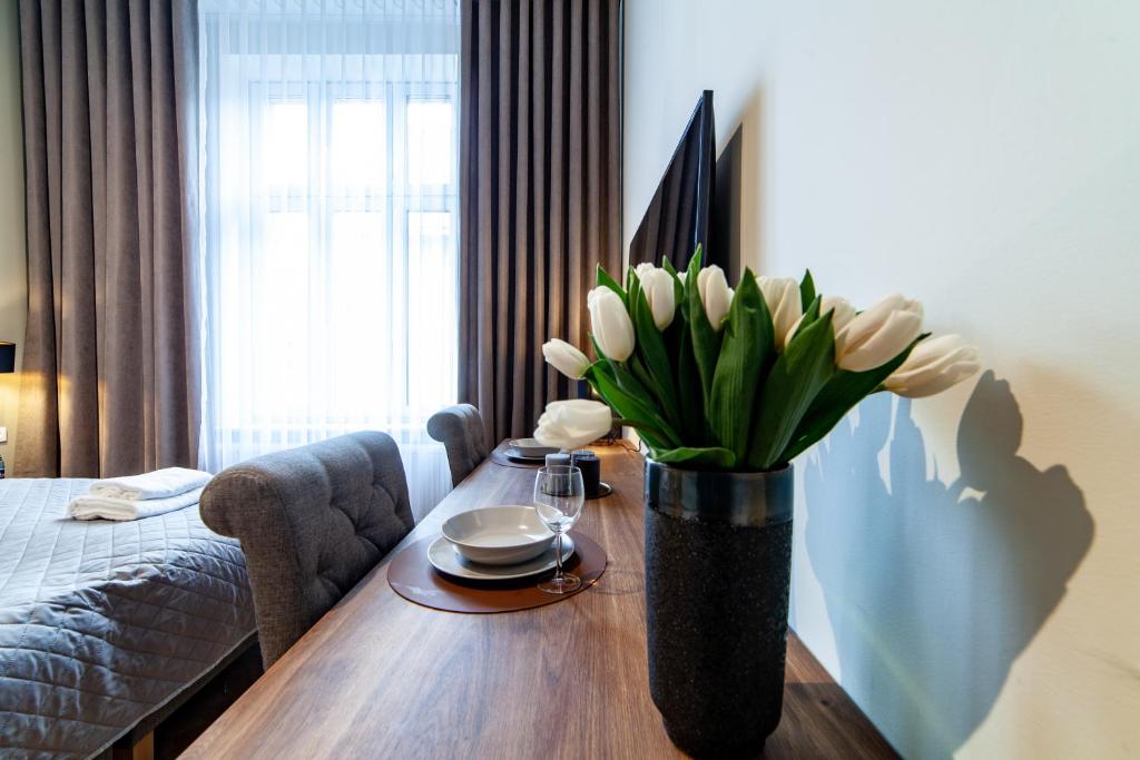 Posteľ alebo postele v izbe v ubytovaní MILU Apartments Kurkowa
