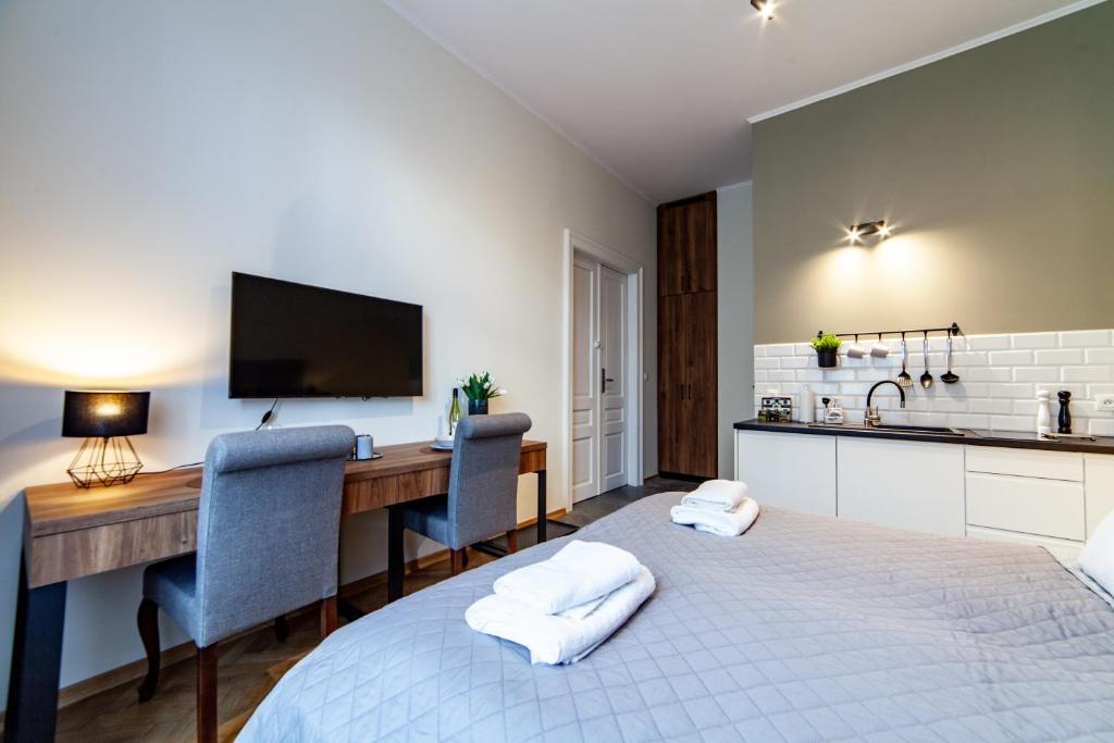 Posteľ alebo postele v izbe v ubytovaní MILU Apartments Kurkowa