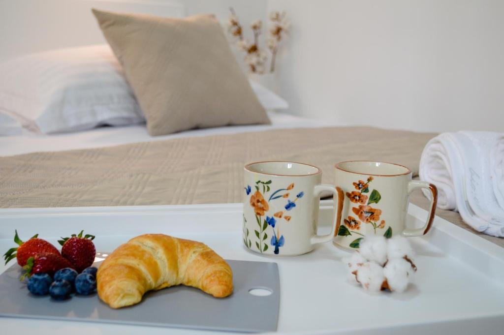 Posteľ alebo postele v izbe v ubytovaní Armanda Rooms