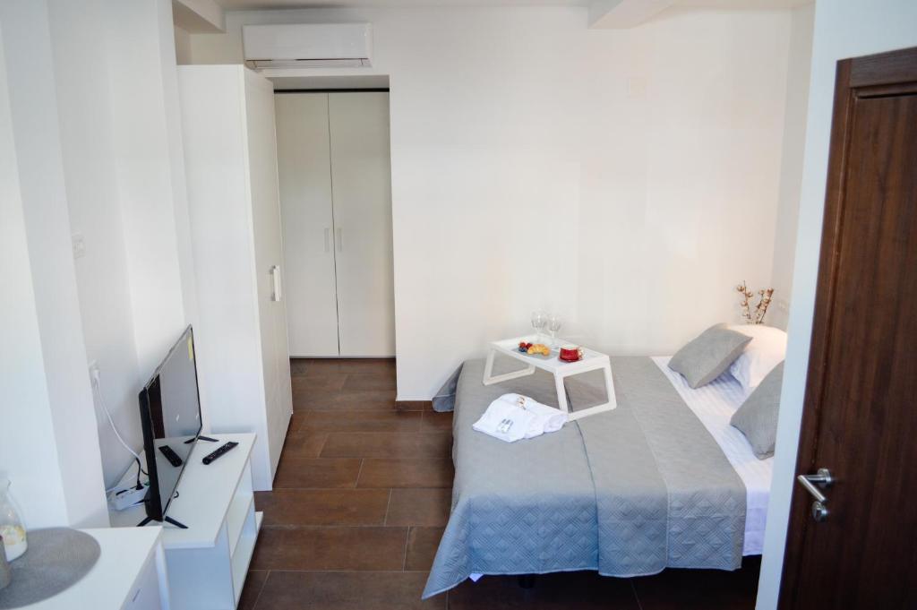 Posteľ alebo postele v izbe v ubytovaní Armanda Rooms
