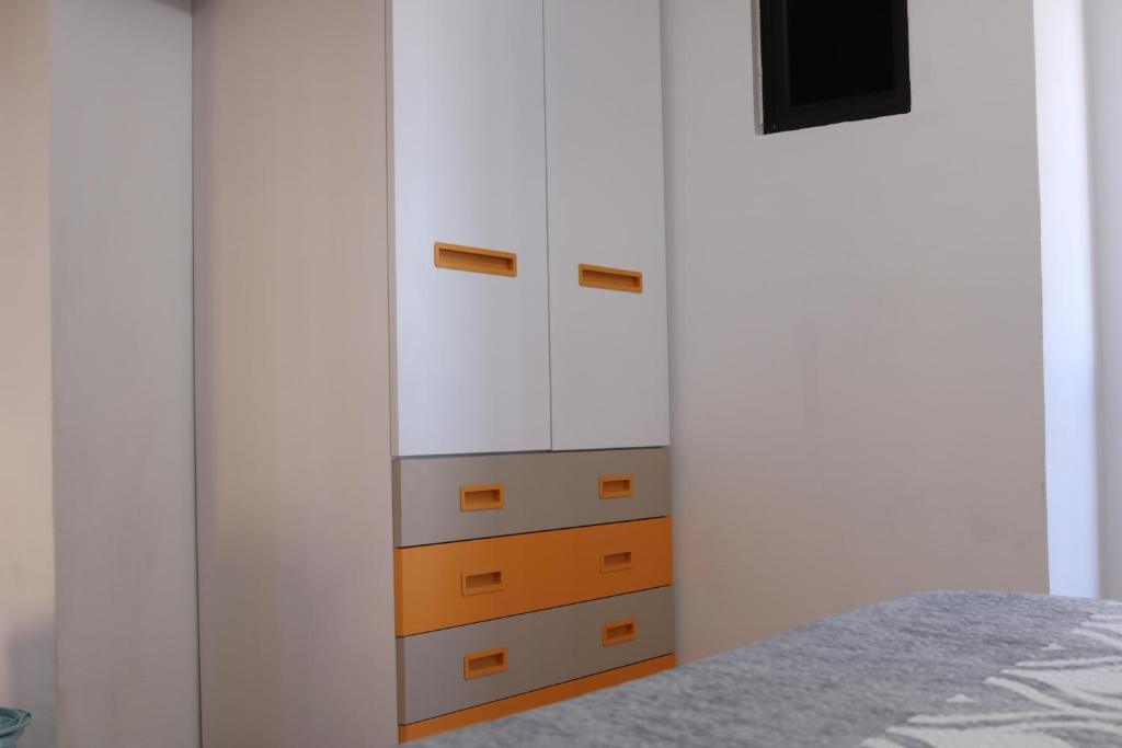 Postel nebo postele na pokoji v ubytování Apartamentos La Carmen
