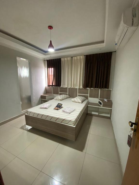 Postel nebo postele na pokoji v ubytování Hotel Cumbica Guarulhos