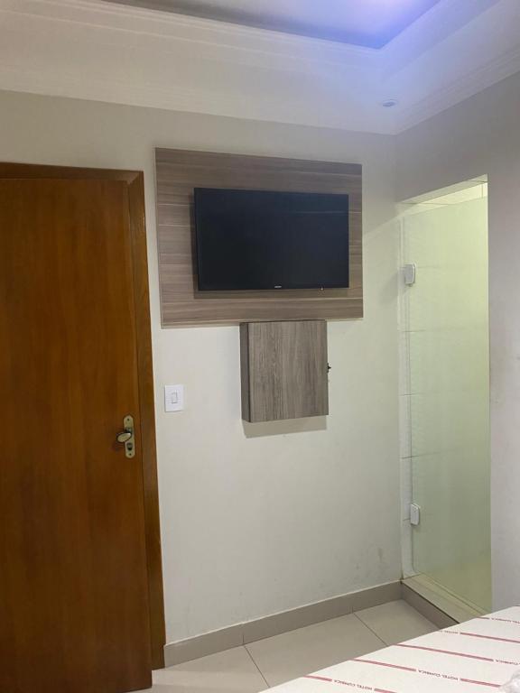 TV a/nebo společenská místnost v ubytování Hotel Cumbica Guarulhos