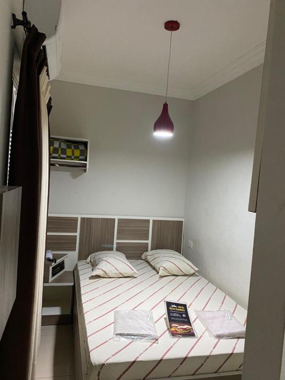 Postel nebo postele na pokoji v ubytování Hotel Cumbica Guarulhos