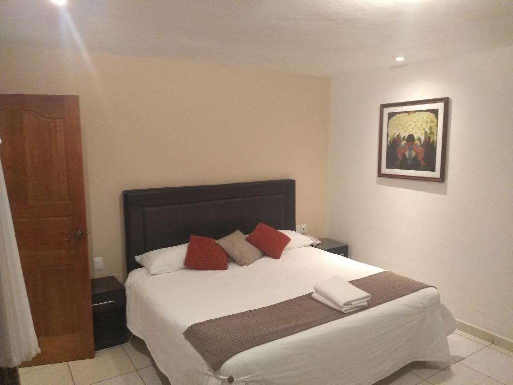Postel nebo postele na pokoji v ubytování Hotel Anber