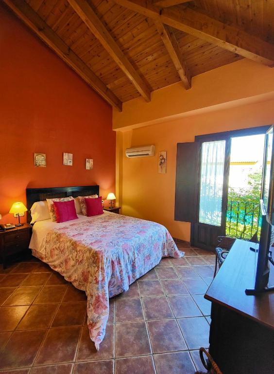 Postel nebo postele na pokoji v ubytování Hotel Doñana Blues