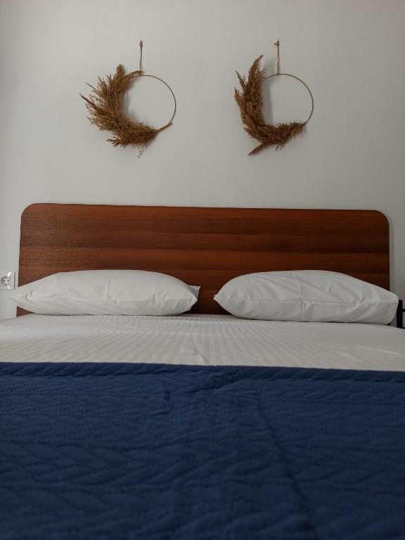 Postel nebo postele na pokoji v ubytování New Era