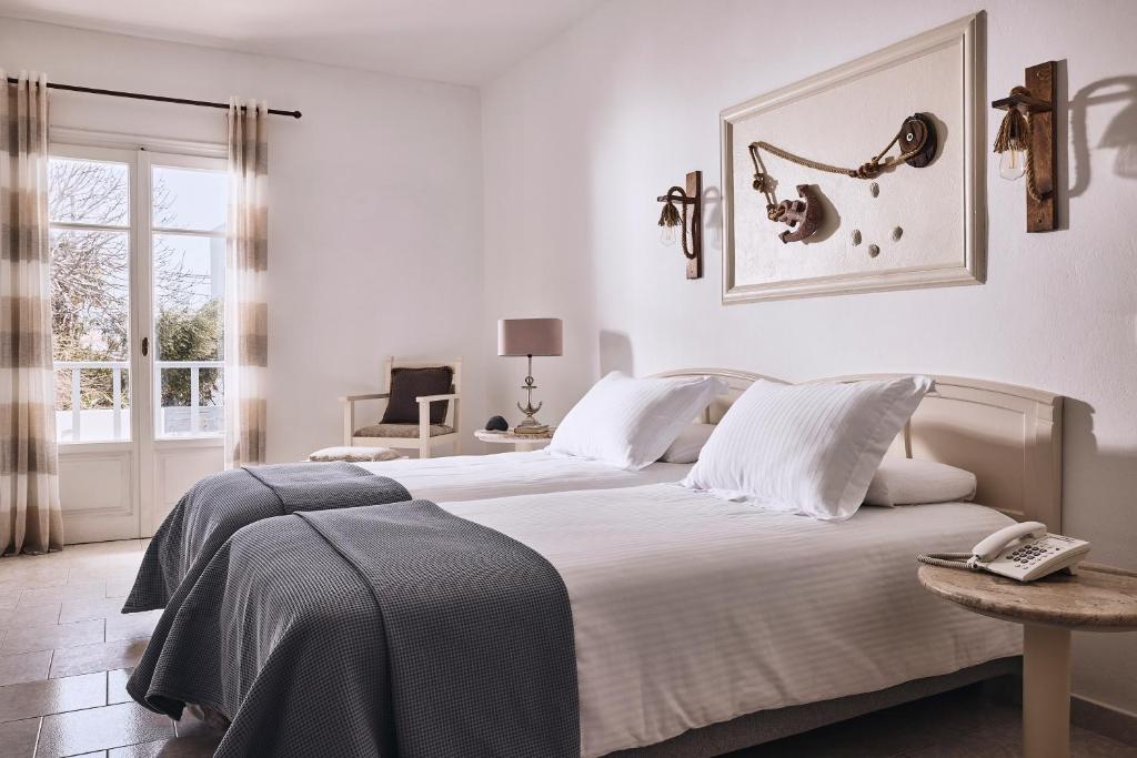 A bed or beds in a room at Capetan Giorgantas