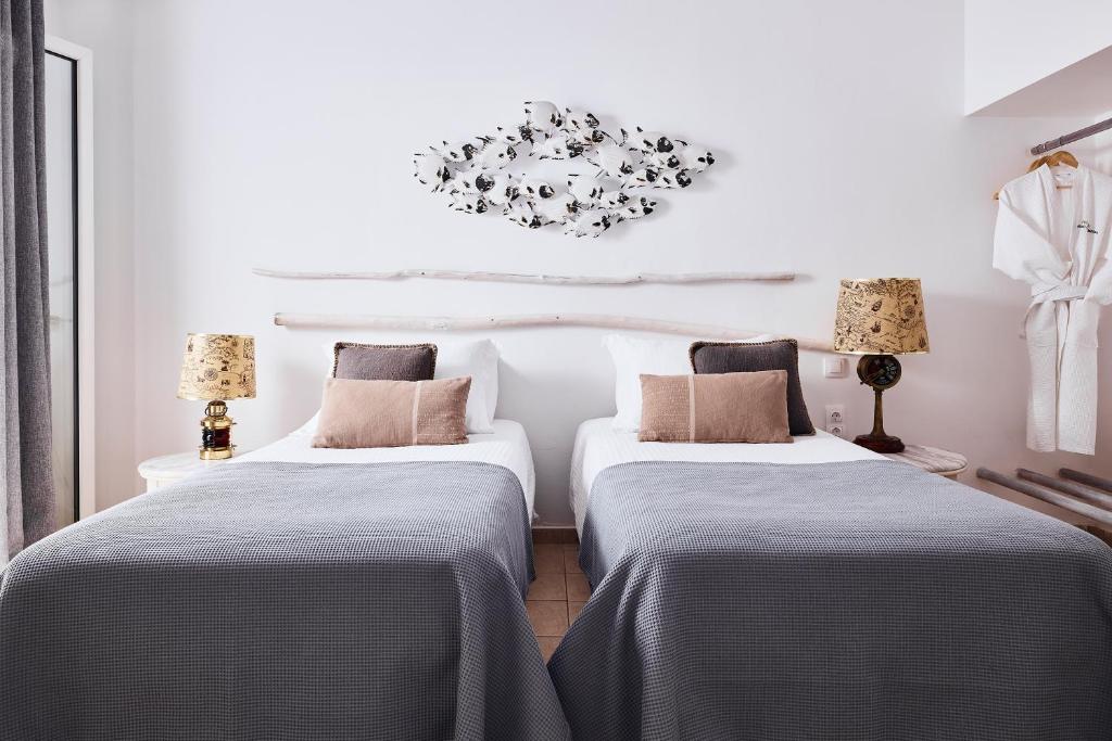 A bed or beds in a room at Capetan Giorgantas