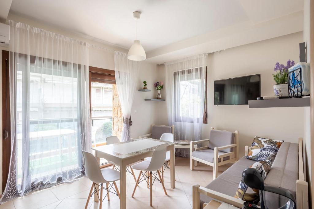 TV a/nebo společenská místnost v ubytování Sea side home Valentina
