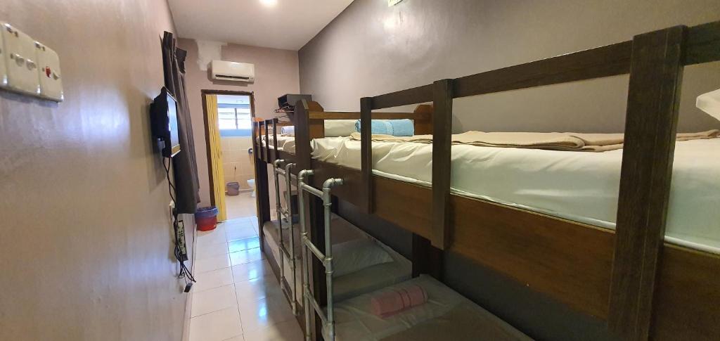 Postel nebo postele na pokoji v ubytování CK Hotel