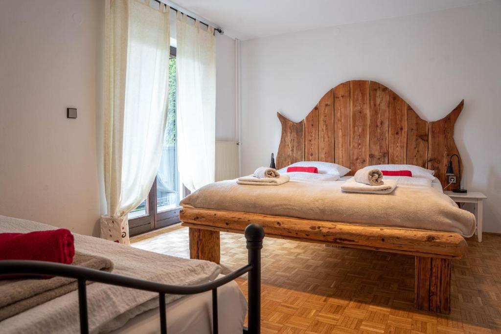 Postel nebo postele na pokoji v ubytování Apartments Trata