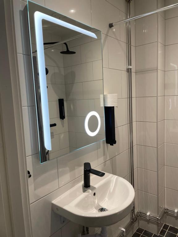 Koupelna v ubytování Birka Hotel