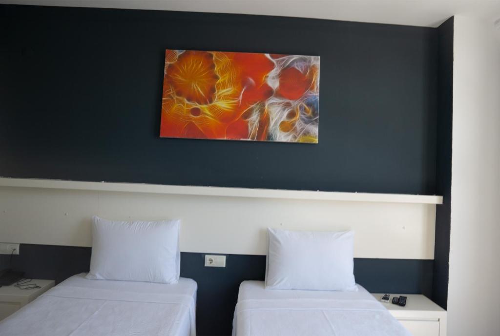 Postel nebo postele na pokoji v ubytování Z OTEL