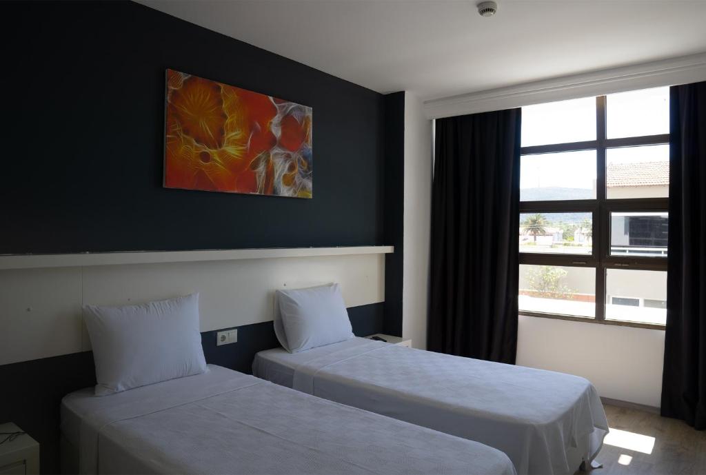 Postel nebo postele na pokoji v ubytování Z OTEL