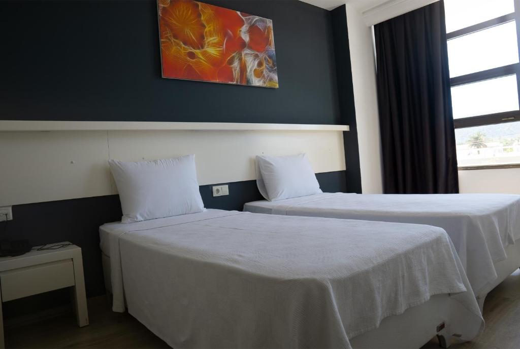 Postel nebo postele na pokoji v ubytování Z OTEL