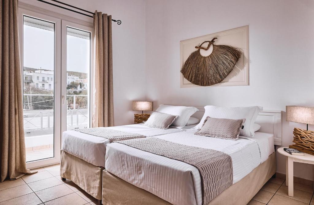 A bed or beds in a room at Capetan Giorgantas