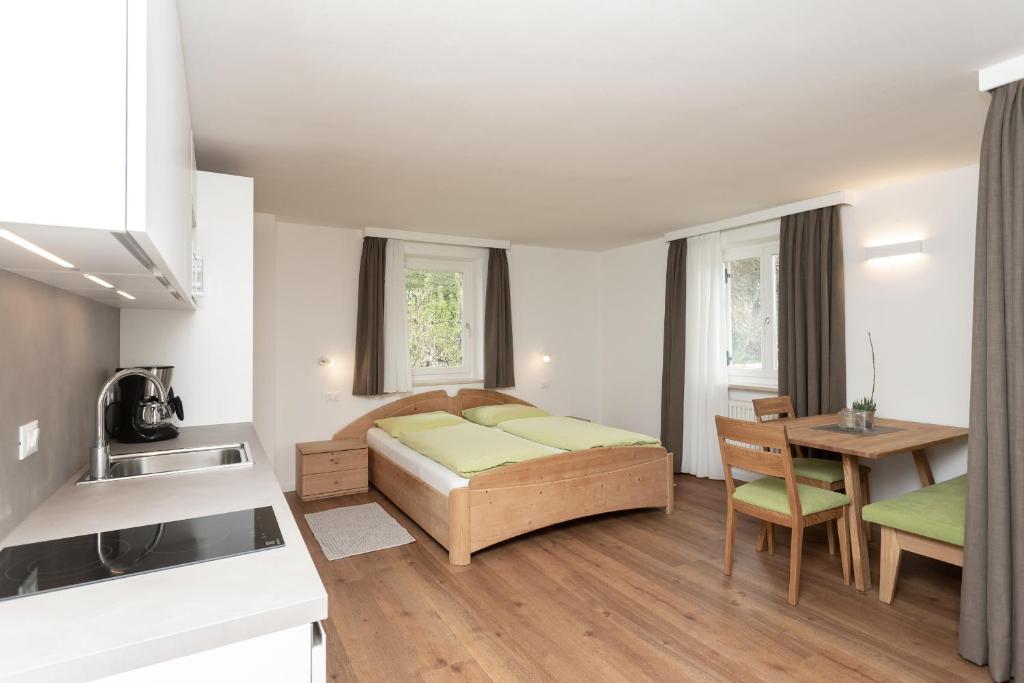 Postel nebo postele na pokoji v ubytování Residence Haus Heinrich