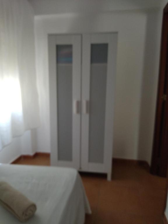 A bed or beds in a room at Santa Justa