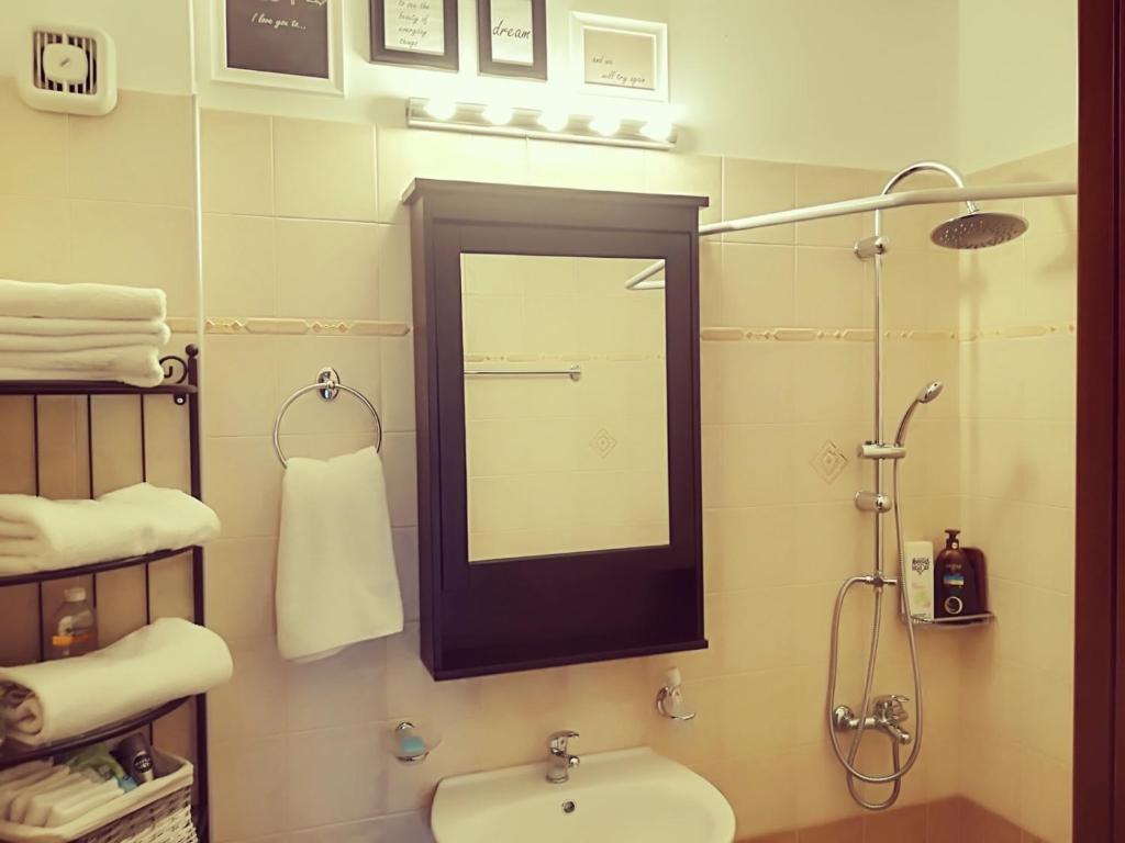 A bathroom at Lux House next to the Airport of Athens. Transport 24h