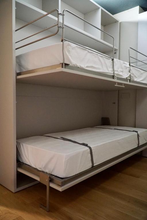 Postel nebo postele na pokoji v ubytování Alpi Azzurre