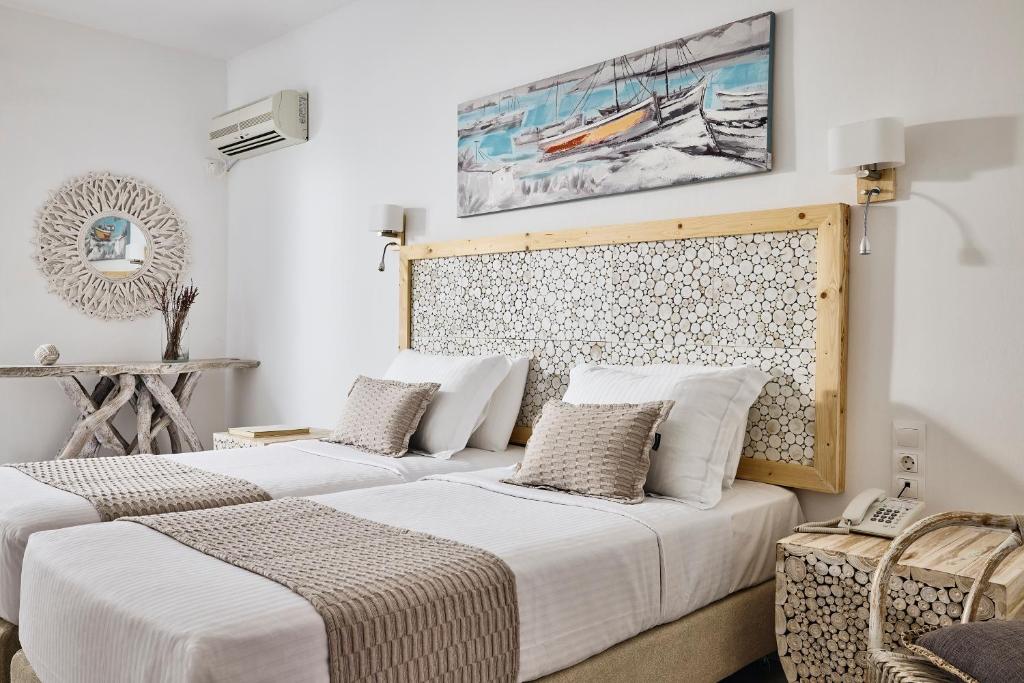 A bed or beds in a room at Capetan Giorgantas