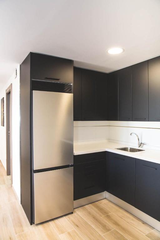 Kuchyňa alebo kuchynka v ubytovaní Apartamentos La Libertad 1