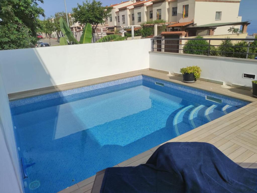 Bazén v ubytovaní Apartamentos La Libertad 1 alebo v jeho blízkosti