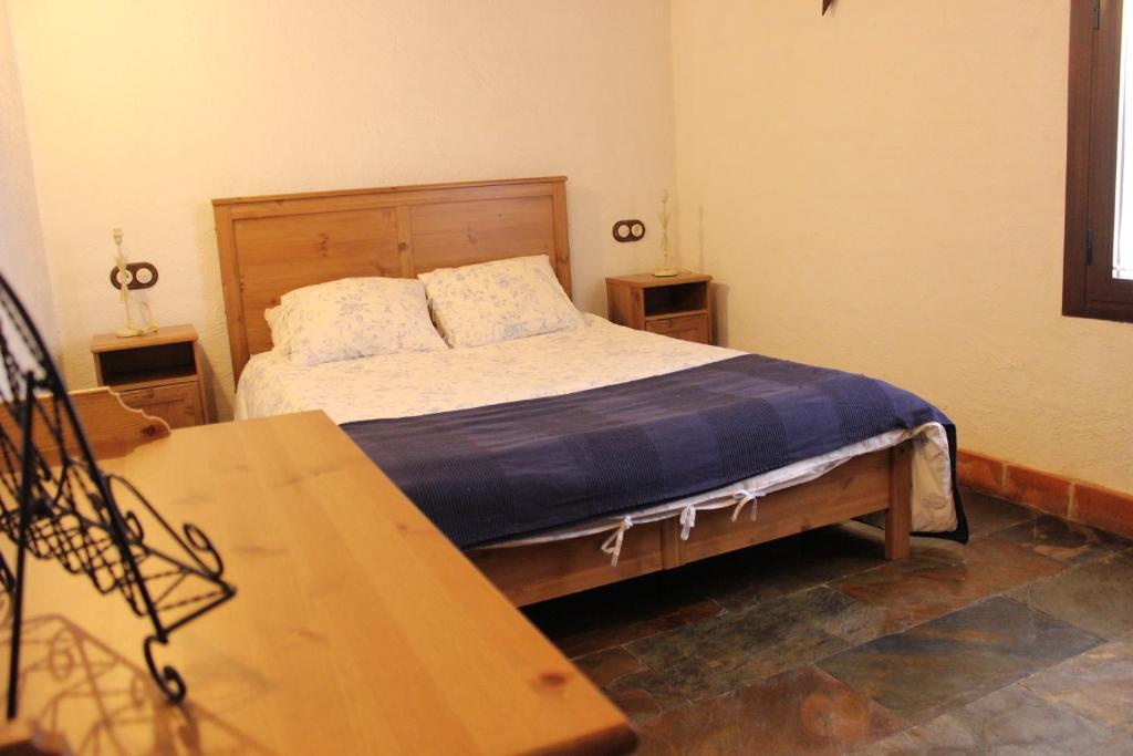Postel nebo postele na pokoji v ubytování Casas Rurales Las Cuevas El Rincón