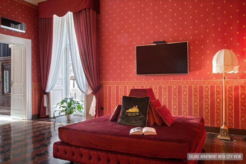 TV a/nebo společenská místnost v ubytování La Casa Sul Nilo
