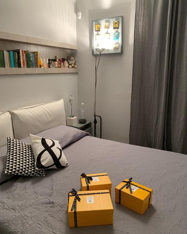 Łóżko lub łóżka w pokoju w obiekcie RaRoom Boutique Home