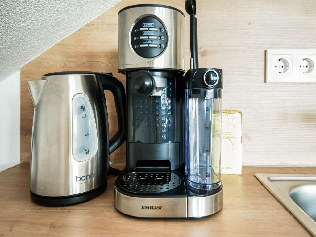 Příslušenství pro přípravu čaje a kávy v ubytování Haus Susi