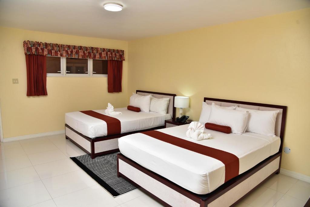 Uma cama ou camas num quarto em Hotel Grand A View