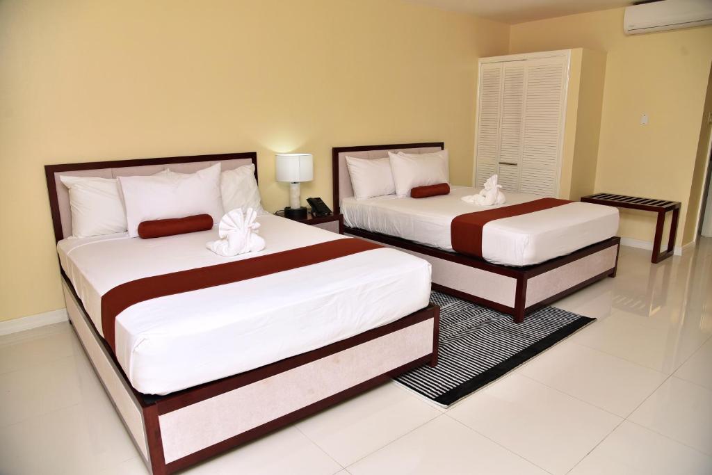 Uma cama ou camas num quarto em Hotel Grand A View