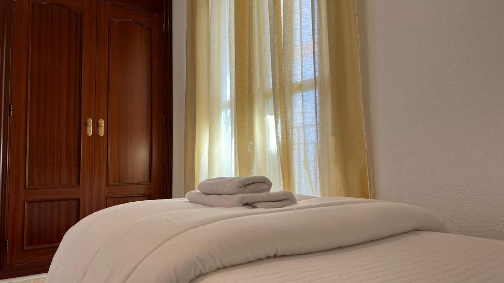 Posteľ alebo postele v izbe v ubytovaní Apartamento Duplex El Tinte