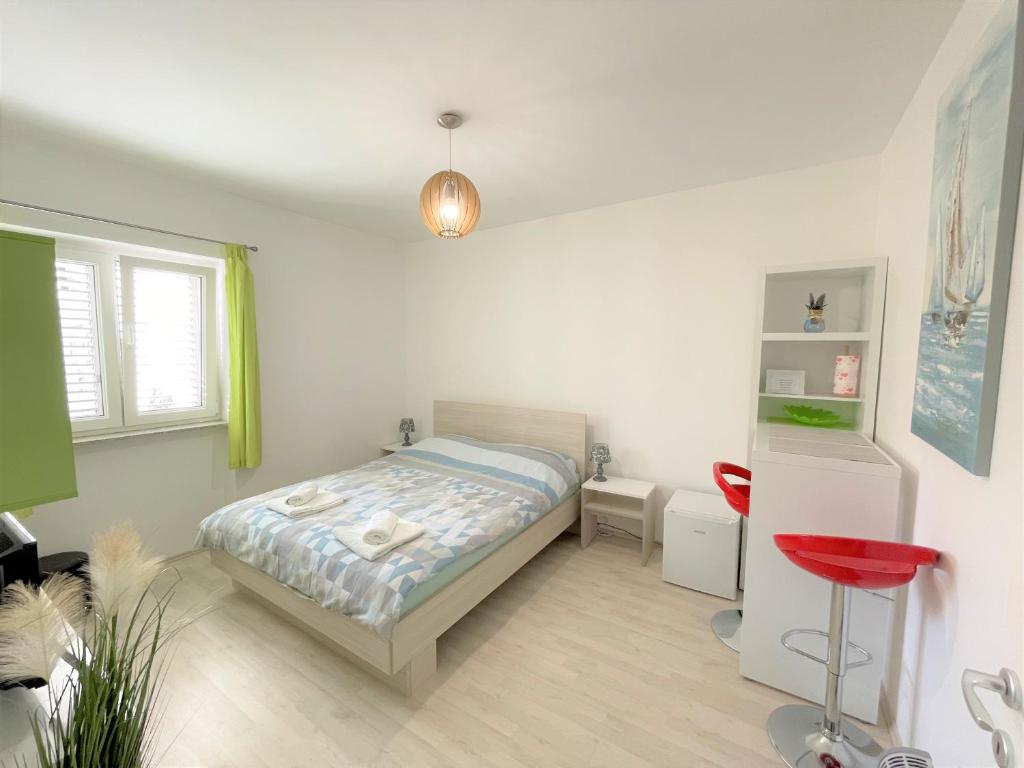 Posteľ alebo postele v izbe v ubytovaní Modern room old Town - Zadar