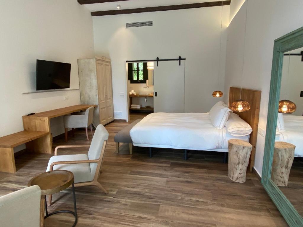Posteľ alebo postele v izbe v ubytovaní HOTEL MAS ARET