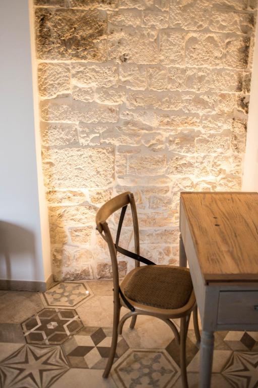 Posezení v ubytování Trullo e Suites Parini 32